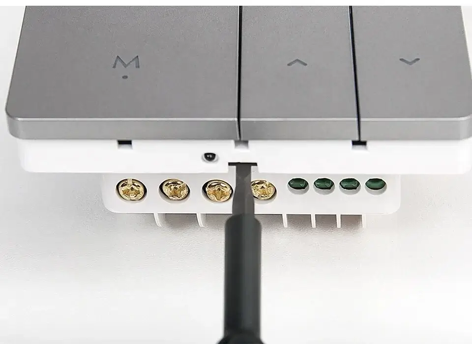 Insert the Screwdriver Into the Gap under the Sensor